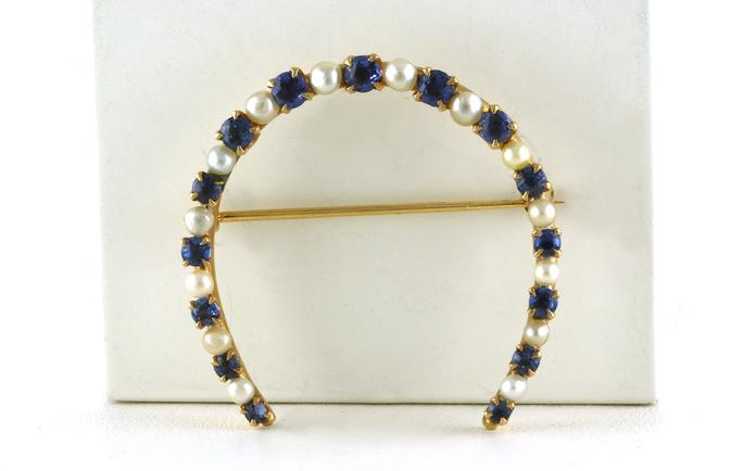 content/products/Estate Piece: Horseshoe Shaped Montana Yogo Sapphires and Pearl Pin in Yellow Gold (1.00cts TWT)