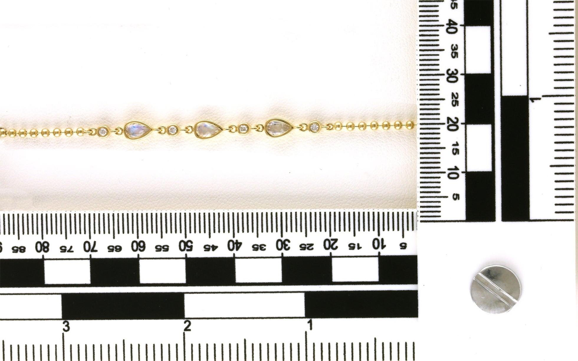 Bezel-set Pear-cut Moonstones and Round Diamond Bracelet in Yellow Gold (0.66cts TWT) scale
